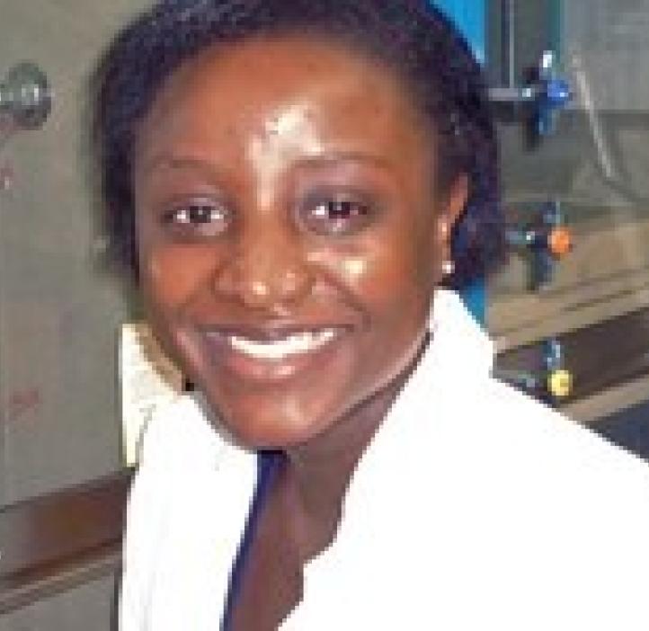 Leah Chibwe sitting in lab