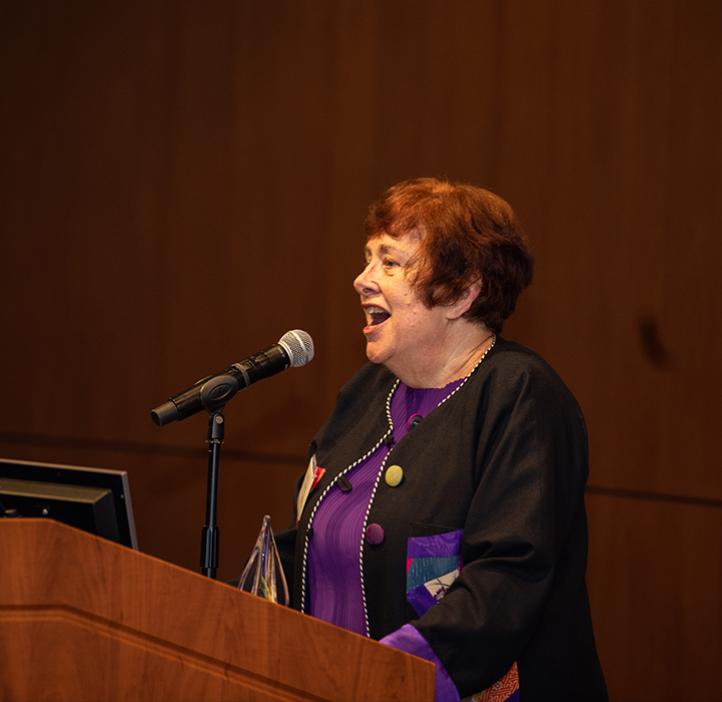 Judy Faucett delivers a speech. 